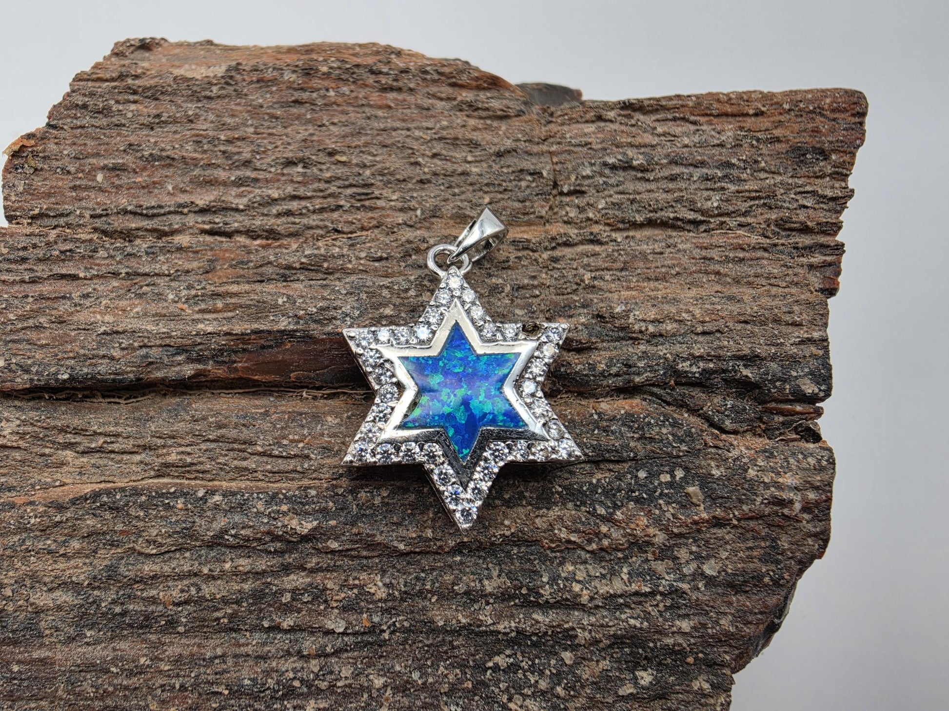 Sterling silver Star of David pendant with blue opal inlay and CZ border, bail included