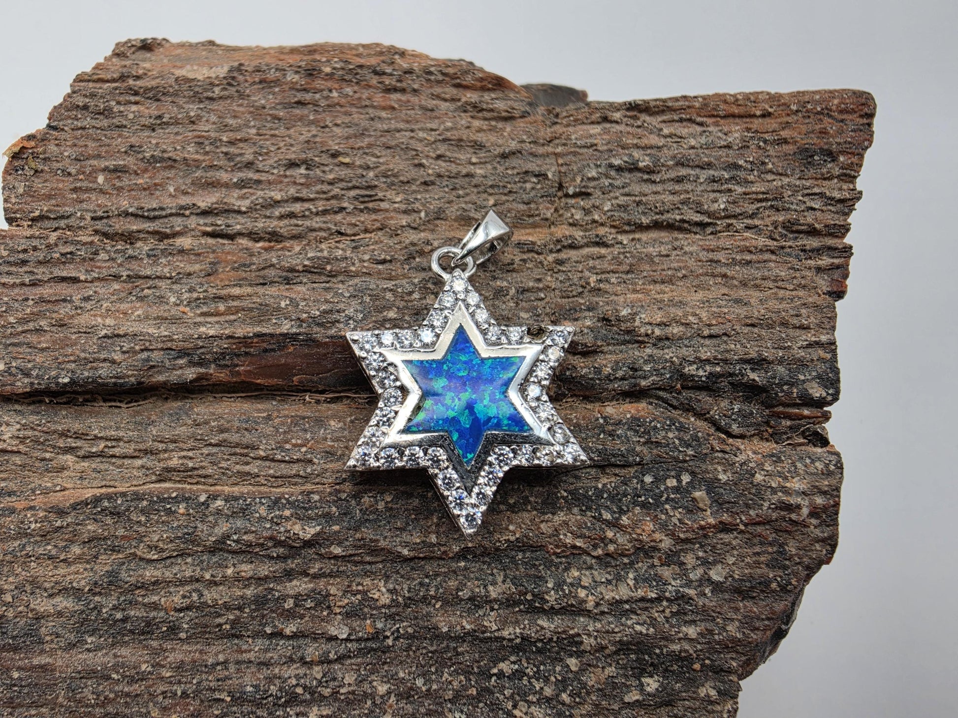 Sterling silver Star of David pendant with blue opal inlay and CZ border, bail included