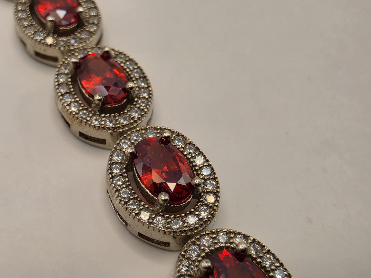 Sterling Silver Natural Garnet CZ Halo Tennis Bracelet 7 Inch 8.5mm 16 Grams Oval Red Gemstone Statement Jewelry