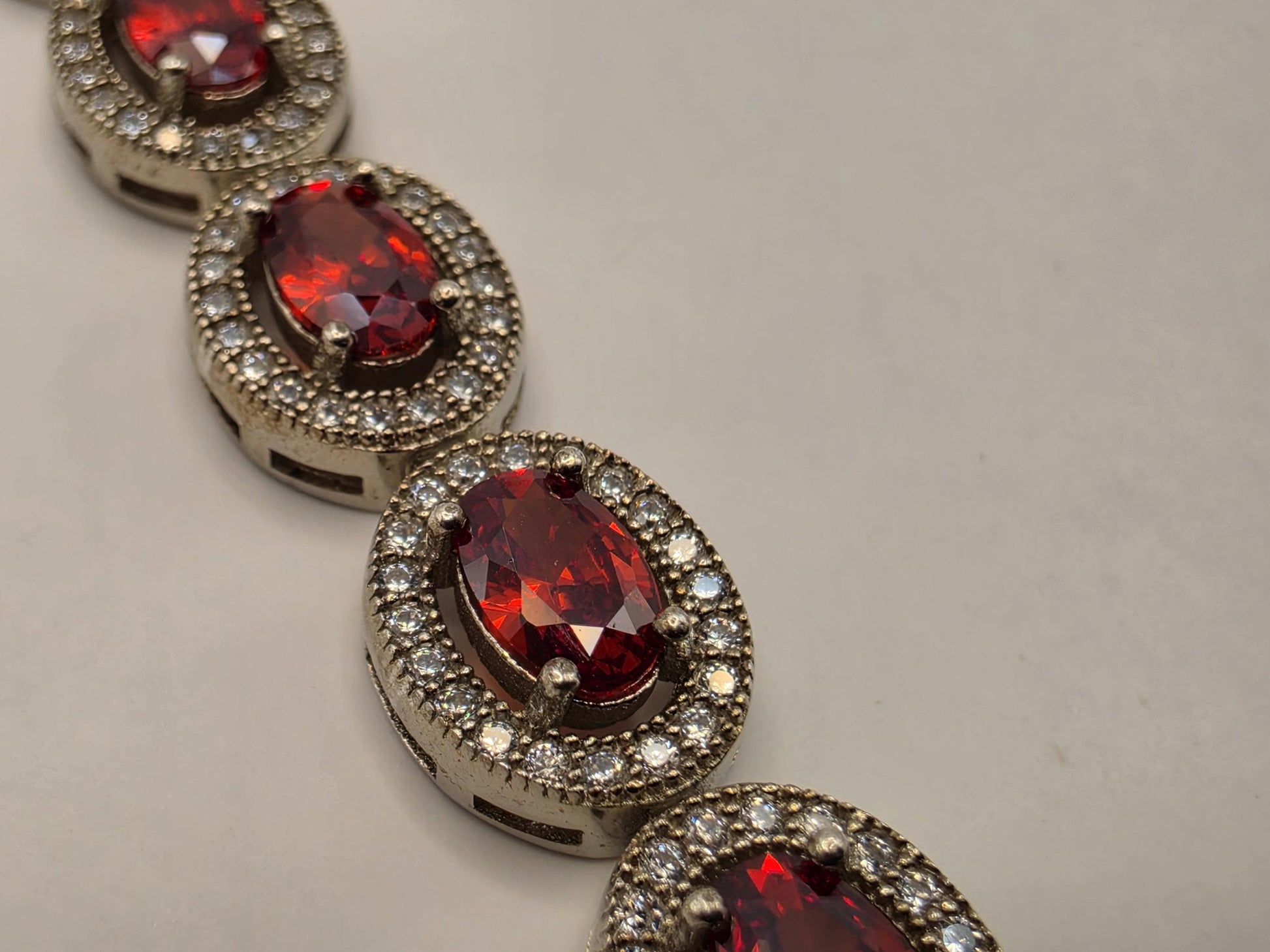 Sterling Silver Natural Garnet CZ Halo Tennis Bracelet 7 Inch 8.5mm 16 Grams Oval Red Gemstone Statement Jewelry