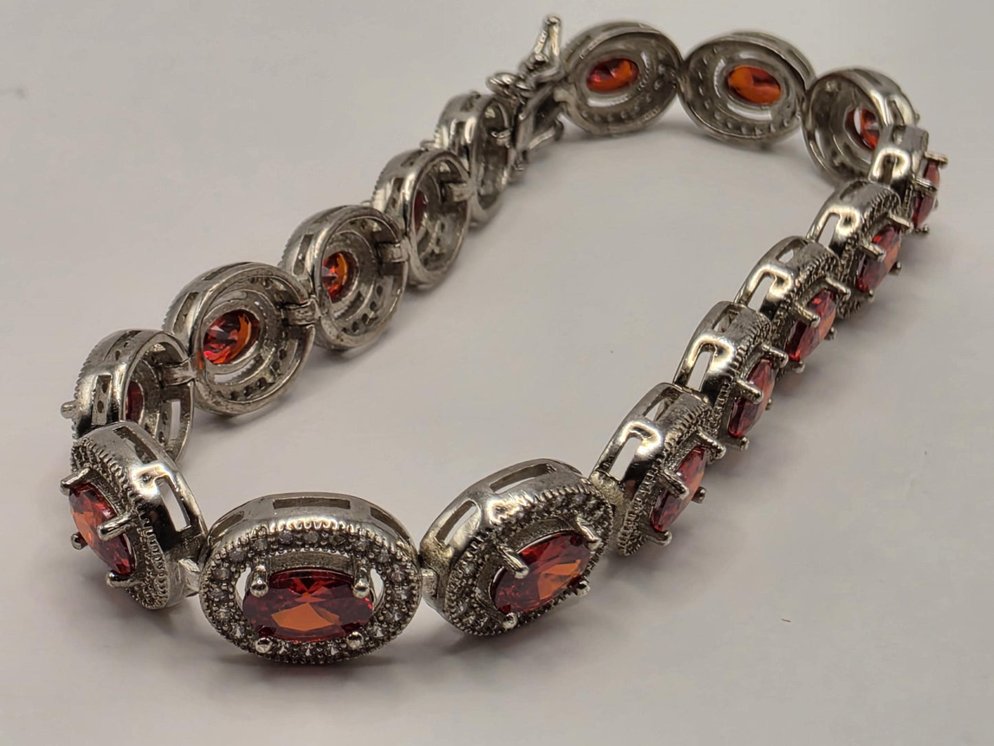 Sterling Silver Natural Garnet CZ Halo Tennis Bracelet 7 Inch 8.5mm 16 Grams Oval Red Gemstone Statement Jewelry