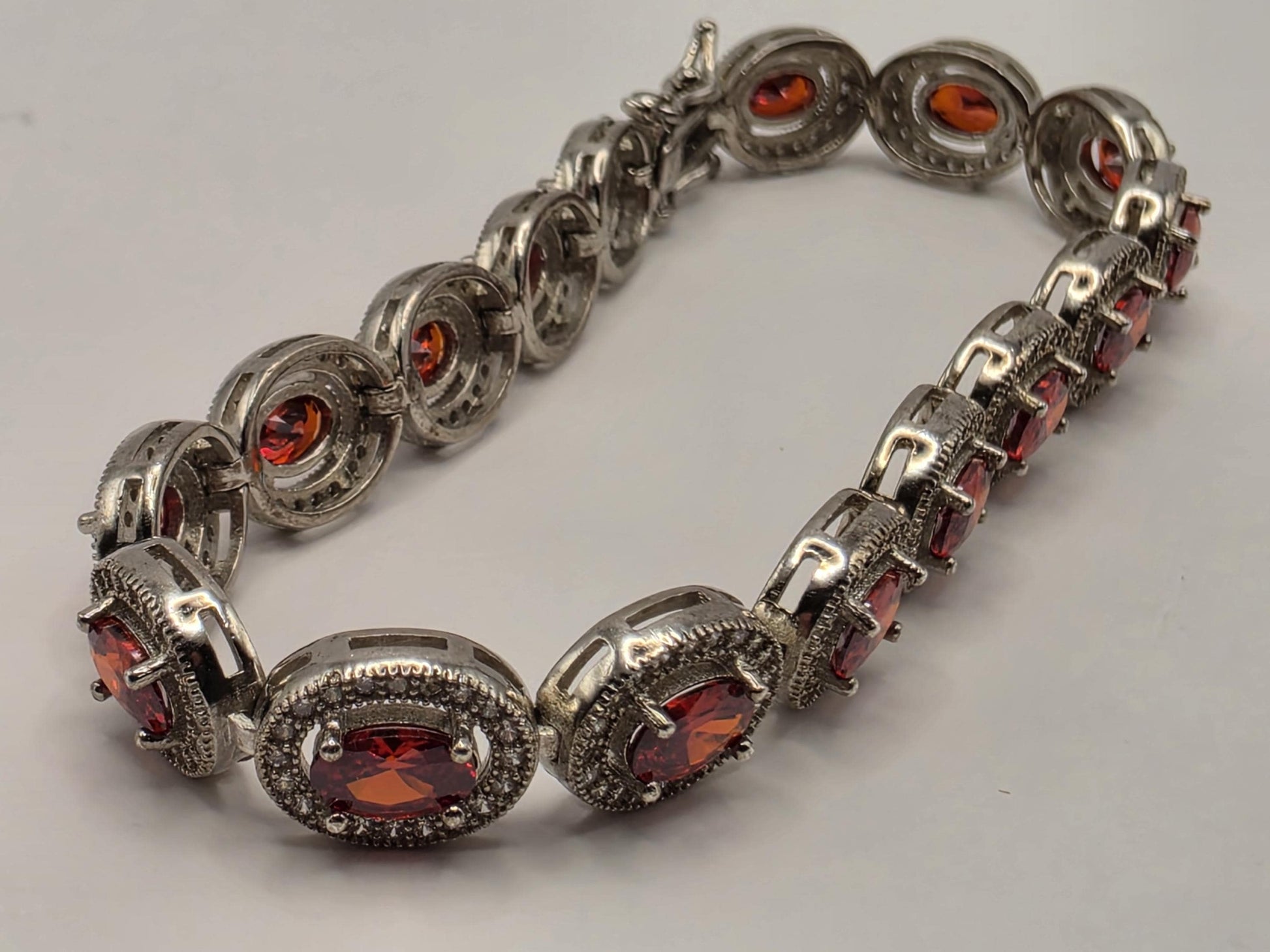 Sterling Silver Natural Garnet CZ Halo Tennis Bracelet 7 Inch 8.5mm 16 Grams Oval Red Gemstone Statement Jewelry