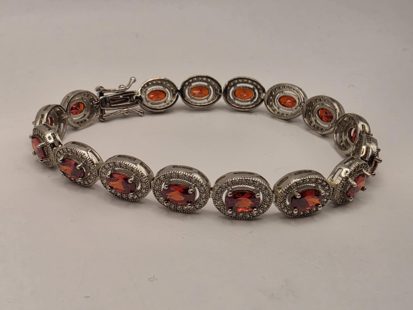 Sterling Silver Natural Garnet CZ Halo Tennis Bracelet 7 Inch 8.5mm 16 Grams Oval Red Gemstone Statement Jewelry
