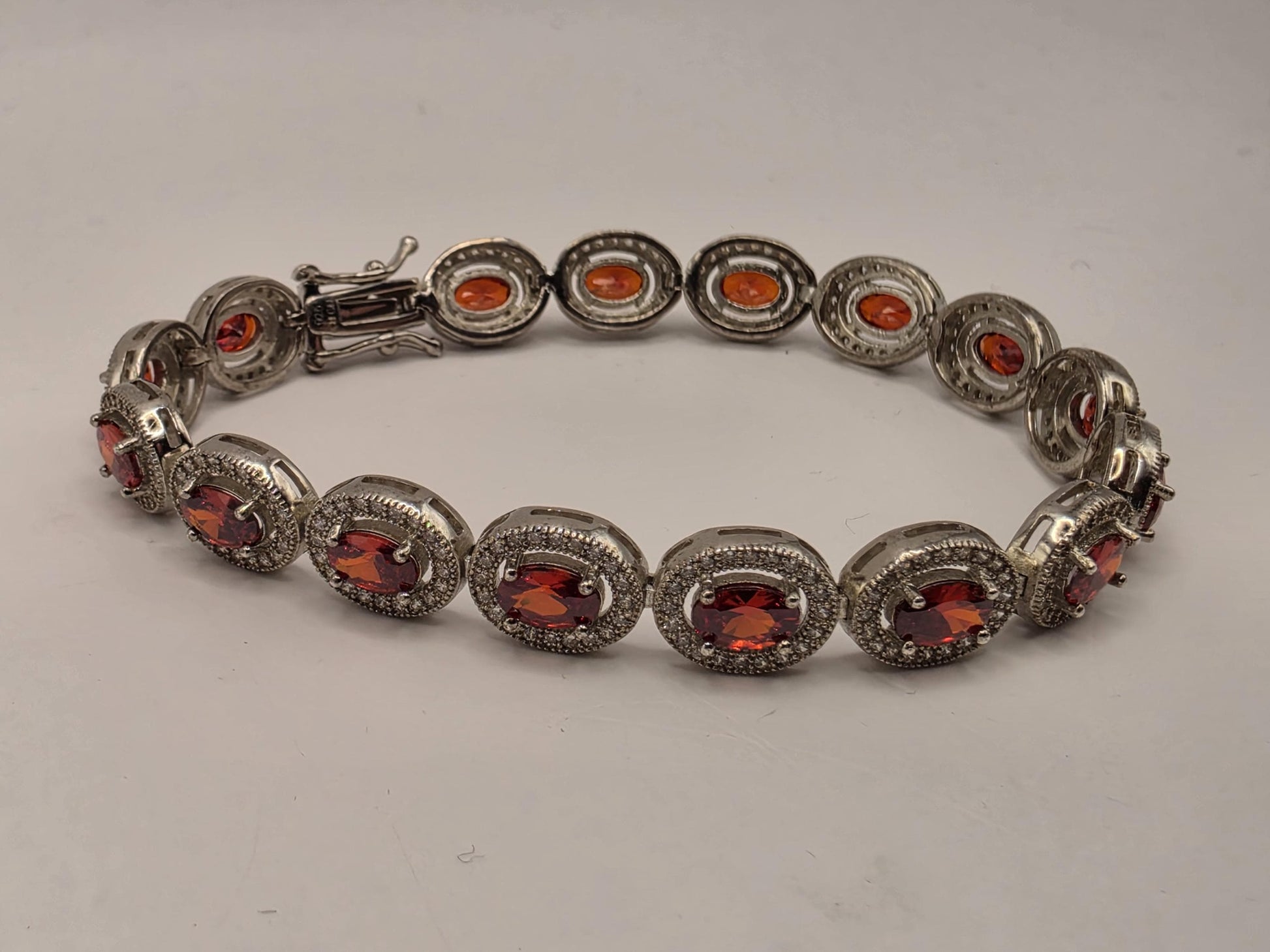 Sterling Silver Natural Garnet CZ Halo Tennis Bracelet 7 Inch 8.5mm 16 Grams Oval Red Gemstone Statement Jewelry